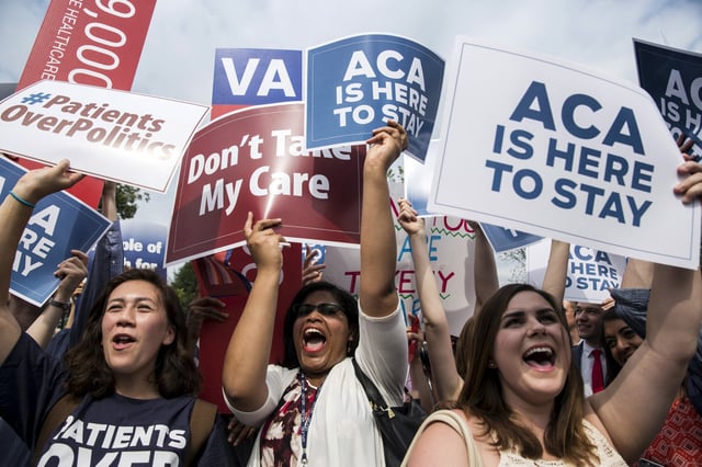 Supporters of the Affordable Care Act celebrate after the Supreme Court upheld the law on June 25, 2015.