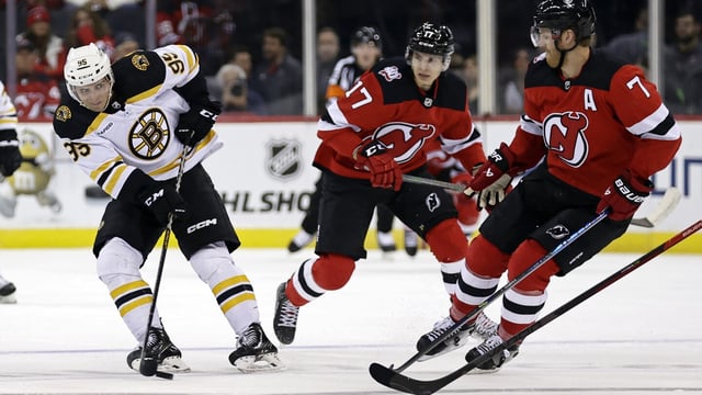 FILE - Boston Bruins' Vinni Lettieri (95) shoots against the New Jersey Devils during the second period of an NHL preseason hockey game Oct. 3, 2022, in Newark, N.J. The Minnesota Wild signed Lettieri to a two-year, two-way contract. The deal brings the grandson of hockey great Lou Nanne back to his home state. The 28-year-old Lettieri will make $750,000 in the NHL and $550,000 in the AHL. He spent most of last season with Boston’s minor-league affiliate. He had 23 goals and 26 assists in 48 games for Providence. (AP Photo/Adam Hunger, File)