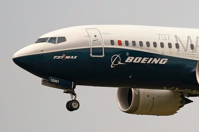 FILE – A Boeing 737 Max jet prepares to land at Boeing Field following a test flight in Seattle, Sept. 30, 2020. Some engineers for the Federal Aviation Administration wanted to ground the Boeing 737 Max soon after a second deadly crash, but top officials in the agency overruled them, according to a government watchdog. The inspector general of the Transportation Department said in a new report Friday, April 28, 2023, that FAA officials wanted to sort out raw data about the two crashes, and held off grounding the plane despite growing international pressure. (AP Photo/Elaine Thompson, File)