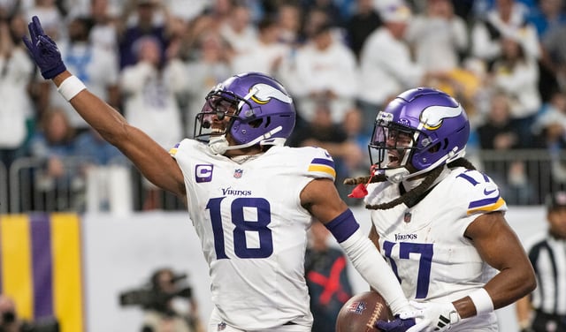 MINNEAPOLIS, MINNESOTA - DECEMBER 24: Justin Jefferson #18 of the Minnesota Vikings celebrates with K.J. Osborn #17 after scoring a touchdown in the second quarter of the game against the Detroit Lions at U.S. Bank Stadium on December 24, 2023 in Minneapolis, Minnesota. (Photo by Stephen Maturen/Getty Images)