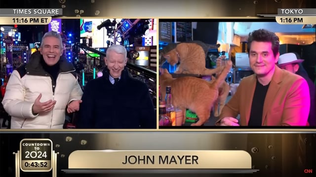 Andy Cohen and Anderson Cooper interview John Mayer while he is at a cat cafe in Japan.