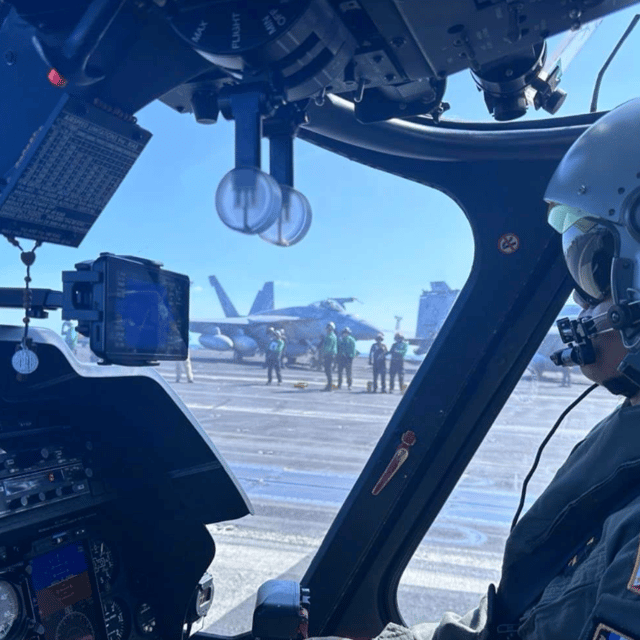 This photo, uploaded to social media January 3, 2024, shows Filipino pilot executes a final check of a Philippine navy AW109 helicopter on the deck of Nimitz class aircraft carrier the USS Carl Vinson. The U.S. joined the Philippines for two days of joint naval drills in the South China Sea from January 3-4, 2024.