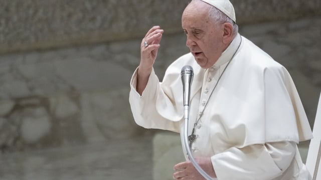 Pope Francis does the sign of the cross during his weekly general audience in the Pope Paul VI hall at the Vatican, Wednesday, Aug. 30, 2023. (AP Photo/Andrew Medichini)