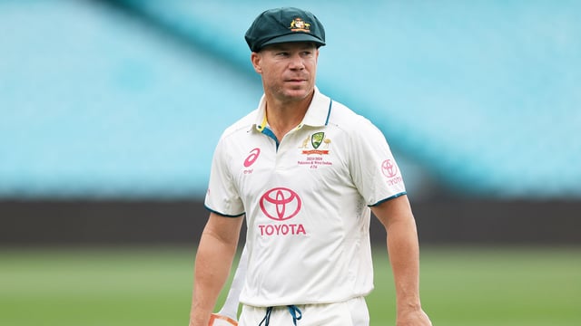 David Warner looks at the pitch ahead of the third Test match between Australia and Pakistan at the Sydney Cricket Ground.