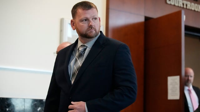 FILE - Former Aurora, Colo., Police Department officer Randy Roedema leaves the courtroom after being convicted of charges in the 2019 death of Elijah McClain during a trial in the Adams County, Colo., Courthouse, Oct. 12, 2023, in Brighton, Colo.