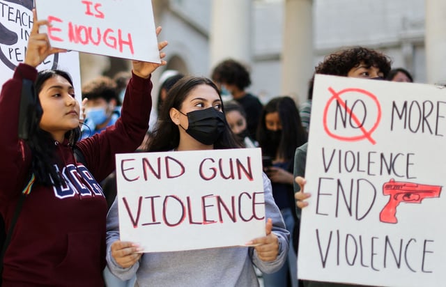 Students from Miguel Contreras Learning Complex high school in Los Angeles demonstrate in front of City Hall after walking out of school to protest gun violence in May 2022.