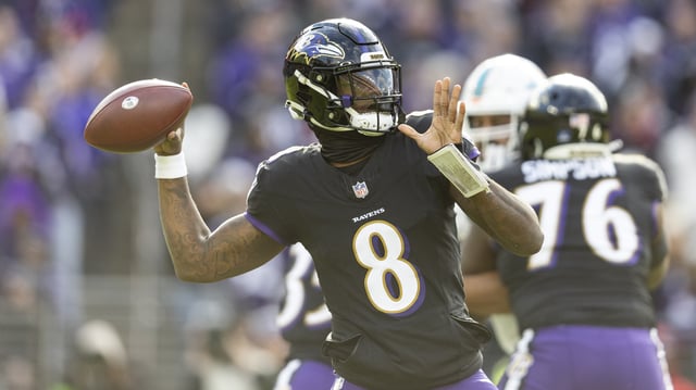 BALTIMORE, MARYLAND - DECEMBER 31: Lamar Jackson #8 of the Baltimore Ravens drops back and looks to pass during an NFL football game between the Baltimore Ravens and the Miami Dolphins at M&T Bank Stadium on December 31, 2023 in Baltimore, Maryland.