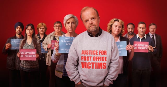 Amit Shah as Jas, Krupa Pattani as Sam, Lesley Nicol as Pam, Ifan Huw Dafydd as Noel, Julie Hesmondhalgh as Suzanne, Toby Jones as Alan Bates, Monica Dolan as Jo, Asif Khan as Mohammad, Will Mellor as Lee and Shaun Dooley as Rudkin in Mr Bates vs The Post Office standing in front of a red background