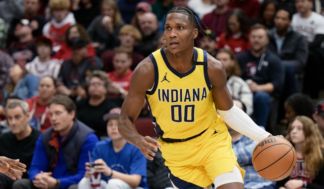 Bennedict Mathurin of the Indiana Pacers controls the ball against the Chicago Bulls on December 28, 2023 at United Center in Chicago, Illinois.