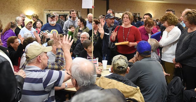 The Iowa Republican caucuses will take place Jan. 15. Pictured: Jefferson Township in Iowa conducts business before the vote is taken during a local Republican Party caucus on Feb. 1, 2016. (Photo: Keith Gillett/Icon Sportswire/Corbis/Icon Sportswire/Getty Images)