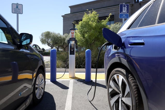 CORTE MADERA, CALIFORNIA - JULY 28: Nissan and Volkswagen electric cars sit parked at a Charge Point EV charging station on July 28, 2023 in Corte Madera, California. Seven major automakers announced plans earlier this week to increase the number of high-powered electric vehicle chargers in the country with 30,000 new charging stations along highways and in urban areas. According to the Energy Department, there are currently an estimated 32,000 chargers across the country. (Photo by Justin Sullivan/Getty Images)