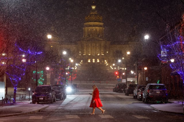 Snow falls in Des Moines, Iowa, on Jan. 8, 2024.