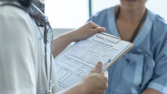 Stock photo of doctor and patient