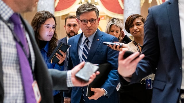 Speaker Mike Johnson (R-La.) addresses reporters as he returns to his office from a series of procedural votes and meetings to discuss funding the government on Thursday, January 11, 2024.
