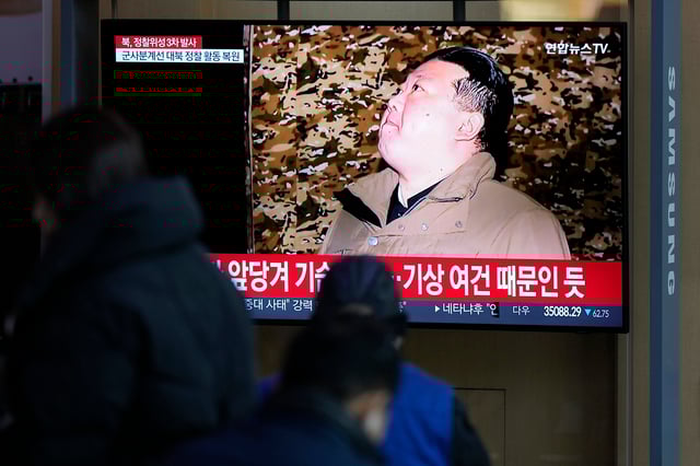 A TV screen shows a report on North Korea’s spy satellite into orbit with its third launch attempt this year with an image of North Korea’s leader Kim Jong Un during a news program at the Seoul Railway Station in Seoul, South Korea, Wednesday, Nov. 22, 2023. North Korea claimed Wednesday to have successfully placed a spy satellite into orbit with its third launch attempt this year, demonstrating the nation’s determination to build a space-based surveillance system during protracted tensions with the United States. The letters read “North Korea, third launch of a spy satellite.” (AP Photo/Lee Jin-man)