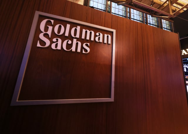 The Goldman Sachs logo is seen at the New York Stock Exchange during morning trading in New York City.