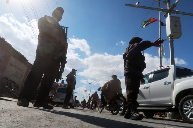 Pakistani security officials at a roadside checkpoint in Quetta, the provincial capital of Balochistan, on Jan. 17, 2024. 