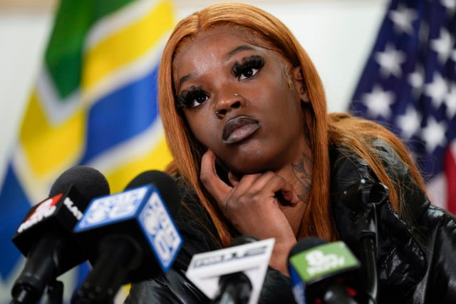 Majiah Washington listens to a question during a news conference at the Portland Fire & Rescue headquarters on Thursday, Jan. 18, 2024, in Portland, Ore. Washington grabbed a baby from a person who was killed after a power line fell on their vehicle. 