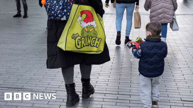 Adult and child on high street