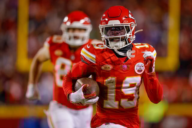 KANSAS CITY, MISSOURI - DECEMBER 10: Kadarius Toney #19 of the Kansas City Chiefs runs for a touchdown on a pass play negated by a penalty on Toney during the fourth quarter against the Buffalo Bills at GEHA Field at Arrowhead Stadium on December 10, 2023 in Kansas City, Missouri. (Photo by David Eulitt/Getty Images)