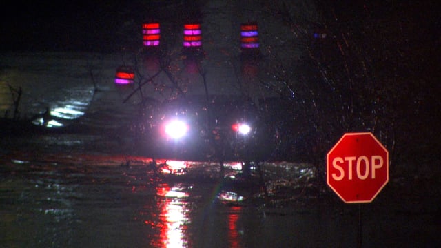 A woman had to be rescued Monday morning after she was swept away by flood waters near Austin Highway.
