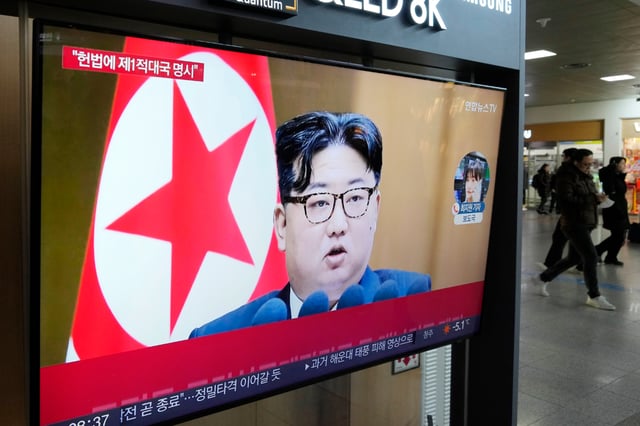 A TV screen shows an image of North Korean leader Kim Jong Un during a news program at the Seoul Railway Station in Seoul, South Korea, Tuesday, Jan. 16, 2024. North Korea has abolished key government organizations tasked with managing relations with South Korea, state media said Tuesday, as authoritarian leader Kim Jong Un said he would no longer pursue reconciliation with his rival. (AP Photo/Ahn Young-joon)