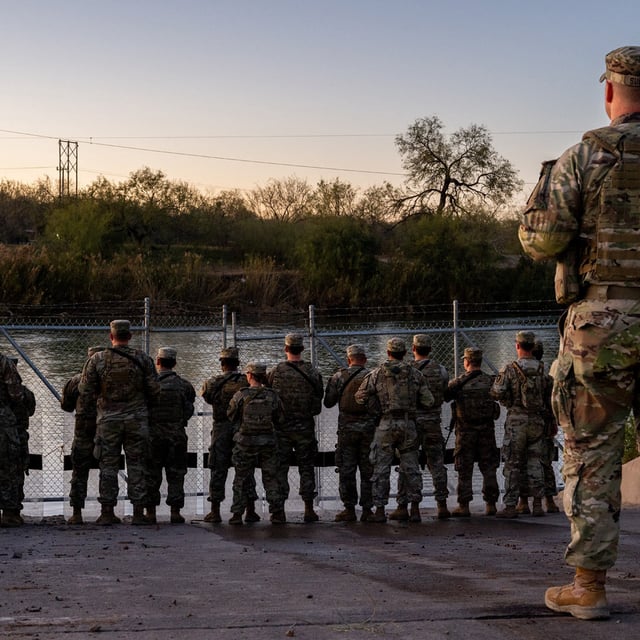 National Guard soldiers stand guard on the banks of the Rio Grande river at Shelby Park on January 12, 2024 in Eagle Pass, Texas. Calls for Texas to seek independence from the union have grown following the Supreme Court's decision against the state on Monday.