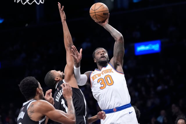 Julius Randle and the Knicks soared into Brooklyn and handed the Nets their fourth straight loss in the Battle of Boroughs series. AP Photo by Mary Altaffer