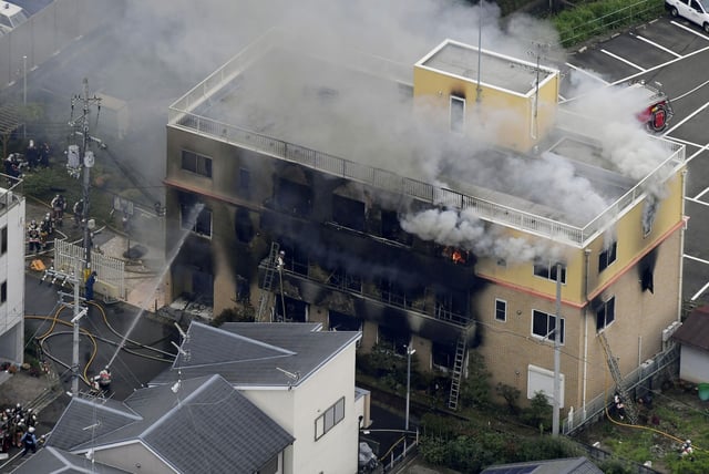 Firefighters battle a blaze at the Kyoto Animation studio in Kyoto, Japan, on July 18, 2019.