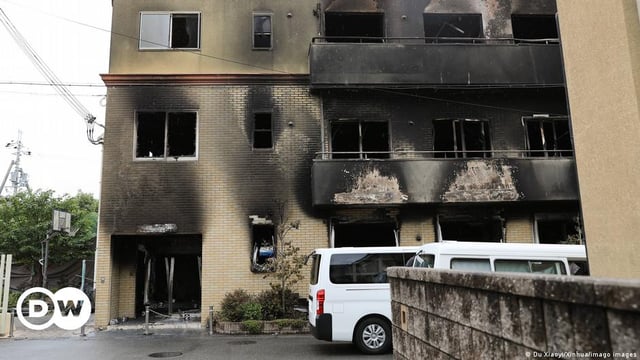 The burnt out studio building with a charred exterior