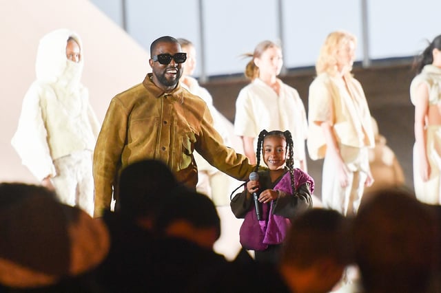 Kanye West and his daughter North West who sings on the runway during the "Yeezy Season 8" show as part of the Paris Fashion Week Womenswear Fall/Winter 2020/2021 on March 02, 2020 in Paris, France.