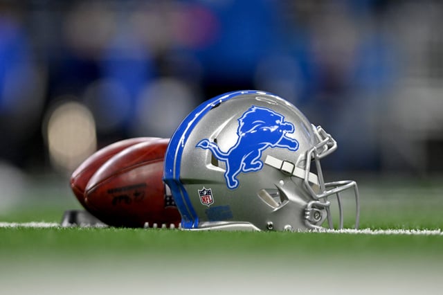 Jan 14, 2024; Detroit, Michigan, USA; Footballs and a Detroit Lions helmet before a 2024 NFC wild card game between the Lions and Los Angeles Rams at Ford Field. Mandatory Credit: Lon Horwedel-USA TODAY Sports