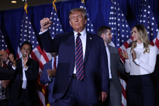 Former President Donald Trump gestures during his election night watch party in Nashua, New Hampshire, on January 23, 2024.