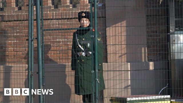 A Chinese paramilitary police stands guard outside the British embassy in Beijing on January 8, 2024.