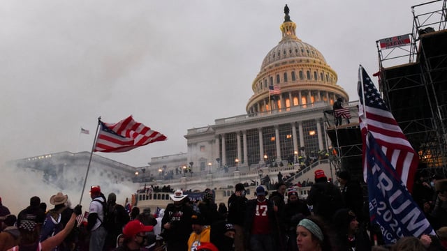 Police clear the U.S. Capitol Building with tear gas as supporters of U.S. President Donald Trump gather outside, in Washington, U.S. January 6, 2021.