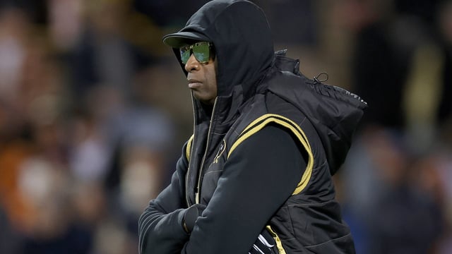 BOULDER, COLORADO - OCTOBER 13: Head coach Deion Sanders of the Colorado Buffaloes walks on the field during pregame against the Stanford Cardinal at Folsom Field on October 13, 2023 in Boulder, Colorado. (Photo by Matthew Stockman/Getty Images)