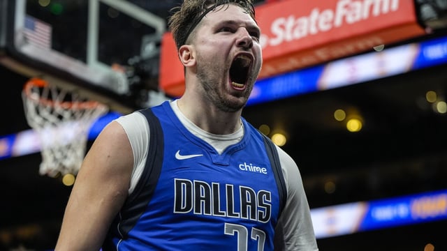 Dallas Mavericks guard Luka Doncic (77) celebrates his shot against the Atlanta Hawks during the second half of an NBA basketball game, Friday, Jan. 26, 2024, in Atlanta. Doncic had 73 points on the night. (AP Photo/Mike Stewart)