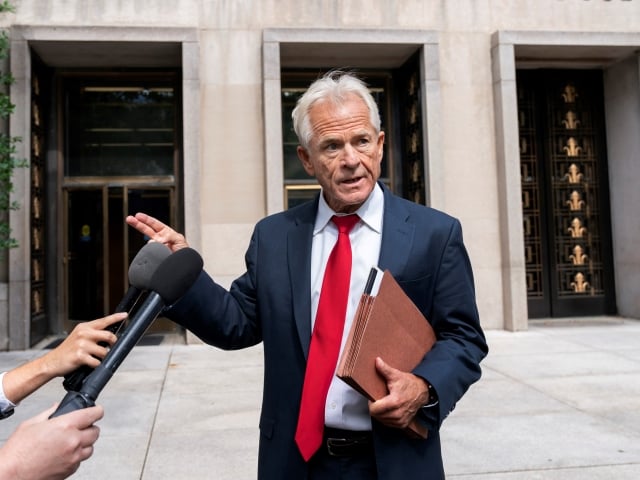 Former Trump White House official Peter Navarro speaks to reporters Friday, June 3, 2022, outside of federal court in Washington. Navarro was indicted Friday on contempt charges after defying a subpoena from the House panel investigating the Jan. 6 attack on the U.S. Capitol. (AP Photo/Jacquelyn Martin)