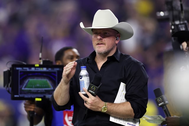 Analyst Pat McAfee reacts in the first half between the Washington Huskies and Michigan Wolverines during the 2024 CFP National Championship game at NRG Stadium on January 08, 2024 in Houston, Texas.