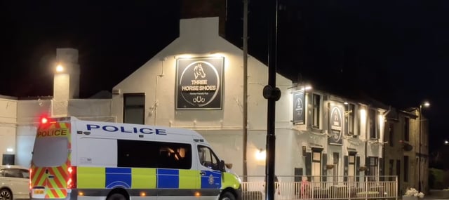 Paramedics outside the scene at the pub