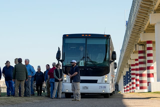 Republican members of Congress arrive via bus at a the Texas-Mexico border, Wednesday, Jan. 3, 2024, in Eagle Pass, Texas. U.S. House Speaker Mike Johnson is leading about 60 fellow Republicans in Congress on a visit to the Mexican border. Their trip comes as they are demanding hard-line immigration policies in exchange for backing President Joe Biden’s emergency wartime funding request for Ukraine. (AP Photo/Eric Gay)