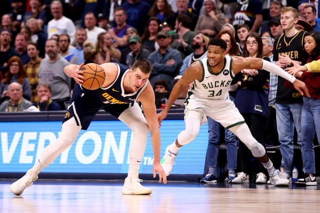 DENVER, COLORADO - JANUARY 29: Giannis Antetokounmpo #34 of the Milwaukee Bucks defends Nikola Jokic #15 of the Denver Nuggets at Ball Arena on January 29, 2024 in Denver, Colorado. NOTE TO USER: User expressly acknowledges and agrees that, by downloading and/or using this Photograph, user is consenting to the terms and conditions of the Getty Images License Agreement. (Photo by Jamie Schwaberow/Getty Images)