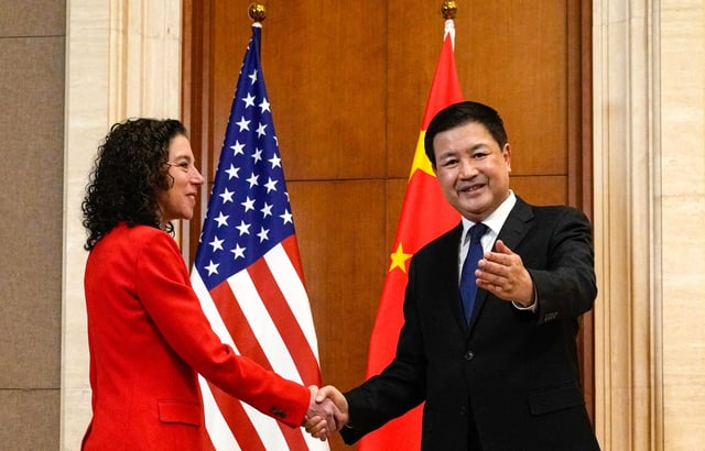 Chinese Minister of Public Security Wang Xiaohong greets US deputy homeland security adviser Jen Daskal ahead of the talks in Beijing. Photo: EPA-EFE