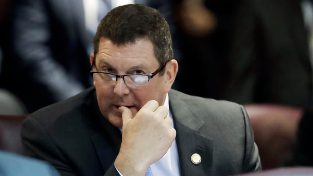 Rep. Jim Lucas, R-Seymour, listens during the start of the General Assembly session at the Statehouse, Wednesday, Jan. 3, 2018, in Indianapolis. (AP Photo/Darron Cummings)