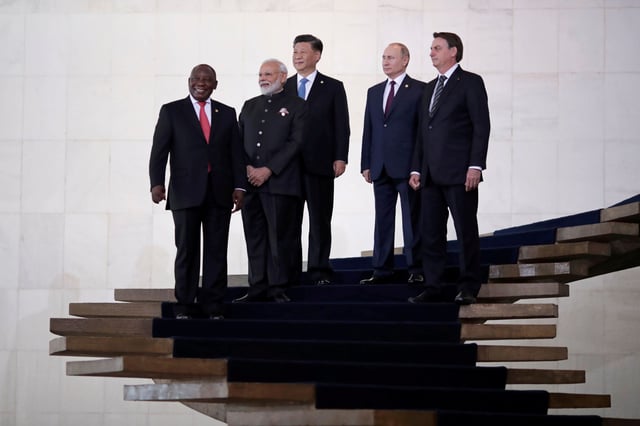 Brazil's Jair Bolsonaro, Russia's Vladimir Putin, China's Xi Jinping, South Africa's Cyril Ramaphosa, and India's Narendra Modi meet during the BRICS summit in Brasilia, Brazil in 2019.