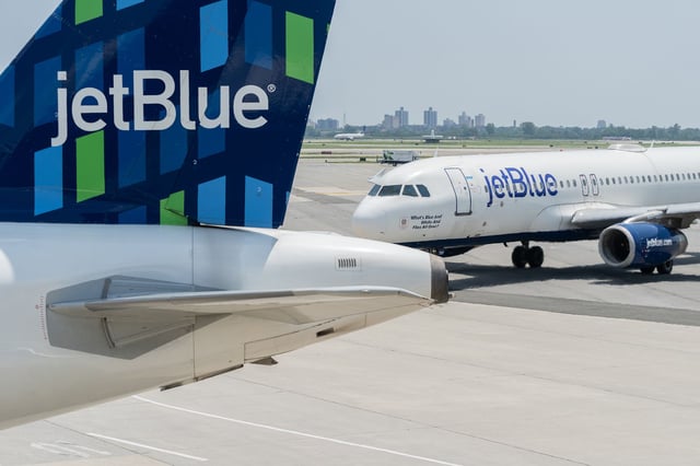 JetBlue airplanes at John F. Kennedy International Airport (JFK) in New York, US, on Sunday, July 23, 2023. JetBlue Airways Corp. is scheduled to release earnings figures on August 1. Photographer: Jeenah Moon/Bloomberg via Getty Images