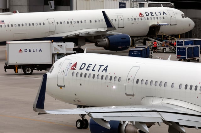 A Delta Air Lines plane leaves the gate on July 12, 2021, at Logan International Airport in Boston.