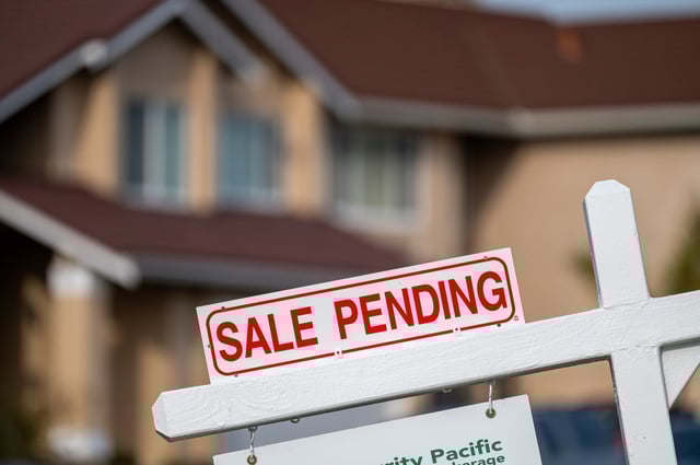 A "Sale Pending" sign in front of a home in Pinole, California, US, on Tuesday, Dec. 26, 2023. 