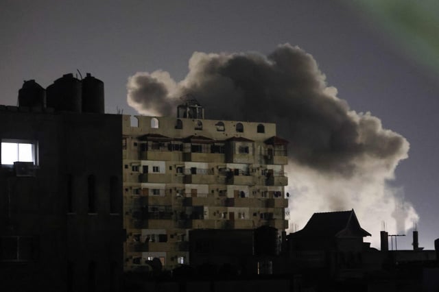 Smoke rises over buildings amid Israeli bombardment in Rafah on February 3. Photo: AFP