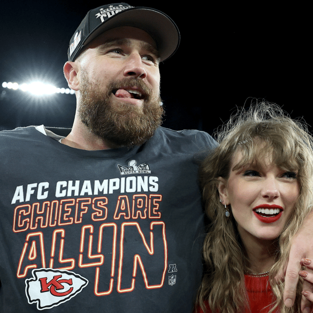 Kansas City Chiefs' Travis Kelce celebrates with Taylor Swift after a 17-10 victory against the Baltimore Ravens in the AFC Championship Game at M&T Bank Stadium on January 28, 2024 in Baltimore, Maryland. Both Kelce and Swift have been at the center of several right-wing conspiracy theories.